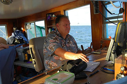 Brad Aplin Captaining a Boat